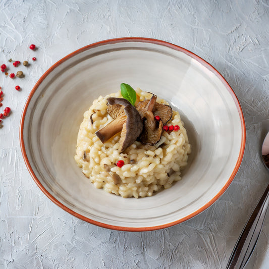 Weißweinrisotto mit Morcheln und Steinpilzen